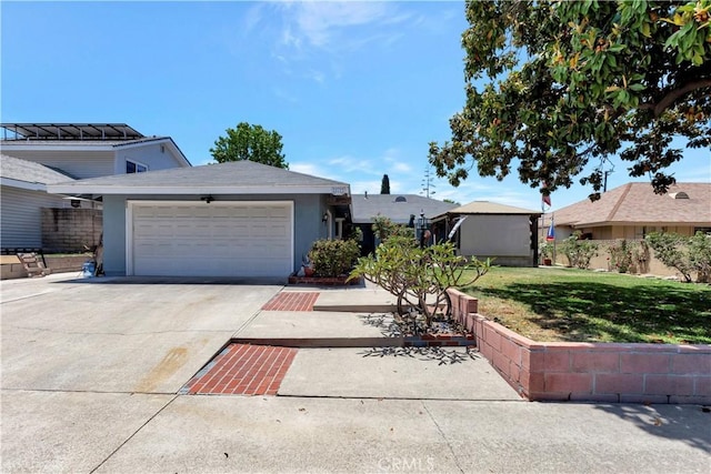 24812 Calle El Toro Grande, Lake Forest, CA 92630 - view of front of property featuring stucco siding, a front lawn, and concrete driveway