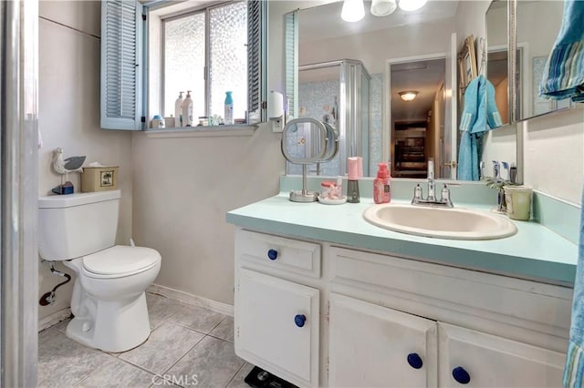 24812 Calle El Toro Grande, Lake Forest, CA 92630 - full bath featuring vanity, tile patterned floors, toilet, a shower stall, and baseboards