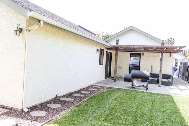 915 Moran Ct, Paso Robles, CA 93446 - back of property with a pergola, a patio area, stucco siding, and an outdoor living space