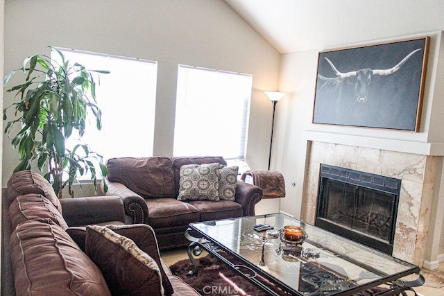915 Moran Ct, Paso Robles, CA 93446 - living room featuring a tiled fireplace and vaulted ceiling