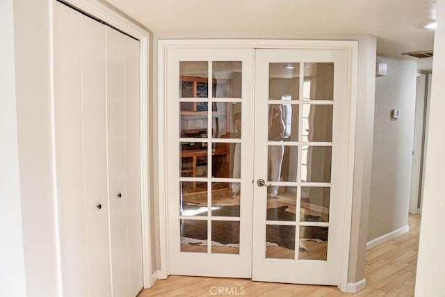 915 Moran Ct, Paso Robles, CA 93446 - entryway featuring wood finished floors, french doors, and baseboards