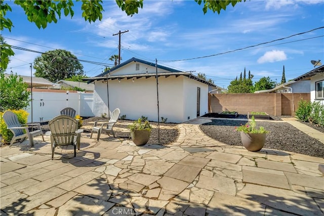 7741 Shoup Ave, West Hills, CA 91304 - fenced backyard featuring a patio
