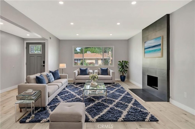 7741 Shoup Ave, West Hills, CA 91304 - living area featuring recessed lighting, baseboards, wood finished floors, and a fireplace