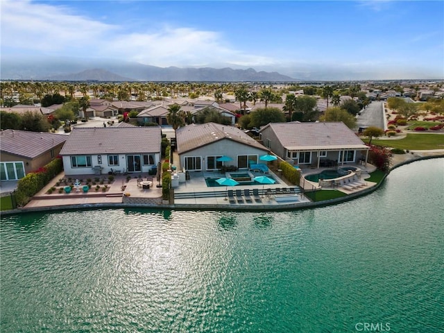 84260 Tramonto Way, Indio, CA 92203 - aerial perspective of suburban area with a water and mountain view and a pool