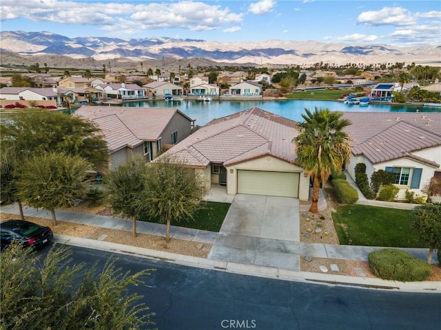 84260 Tramonto Way, Indio, CA 92203 - aerial perspective of suburban area featuring a water and mountain view