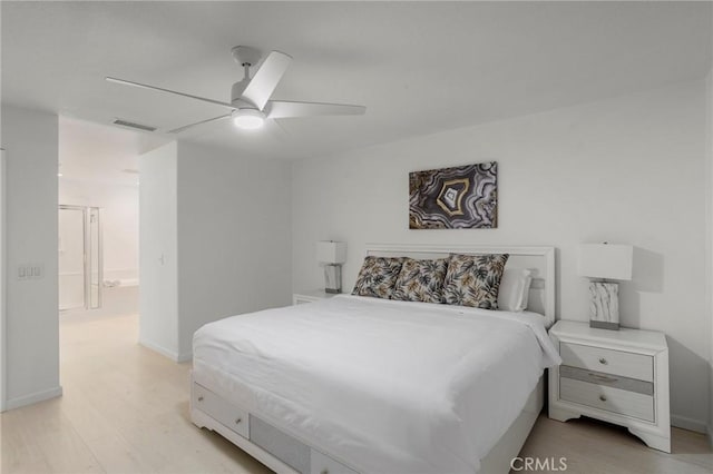 84260 Tramonto Way, Indio, CA 92203 - bedroom featuring light wood finished floors, baseboards, and a ceiling fan