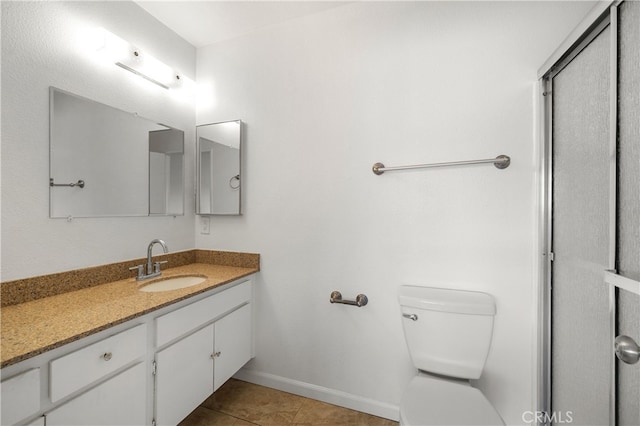 4137 Tiberon Dr, Oceanside, CA 92056 - bathroom with vanity, toilet, baseboards, tile patterned floors, and a shower with shower door