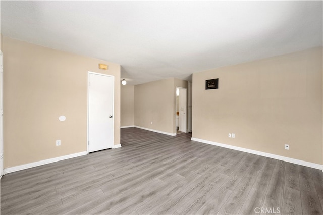 4137 Tiberon Dr, Oceanside, CA 92056 - spare room with baseboards and wood finished floors