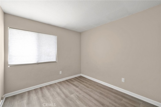 4137 Tiberon Dr, Oceanside, CA 92056 - empty room featuring wood finished floors and baseboards