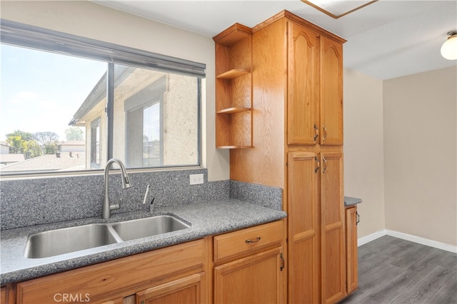 4137 Tiberon Dr, Oceanside, CA 92056 - kitchen featuring a sink, open shelves, dark wood-style flooring, baseboards, and brown cabinets