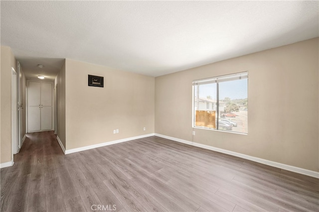 4137 Tiberon Dr, Oceanside, CA 92056 - spare room with wood finished floors and baseboards