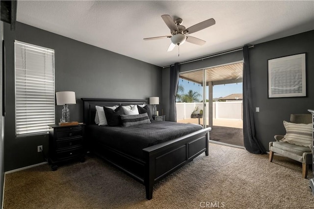 13946 Moqui Way, Corona, CA 92883 - carpeted bedroom featuring access to exterior, a ceiling fan, and baseboards