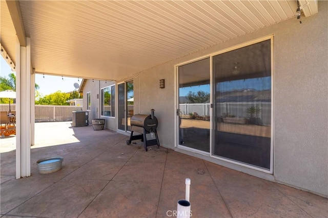 13946 Moqui Way, Corona, CA 92883 - view of patio / terrace with grilling area and central air condition unit