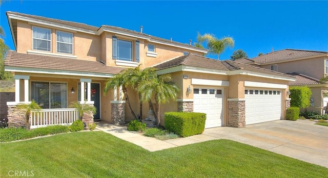 8758 Aspen Ct, Riverside, CA 92508 - view of front of home with a garage, a porch, driveway, stucco siding, and a front lawn