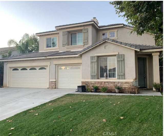 1595 Mountain View Trl, Beaumont, CA 92223 - view of front facade with an attached garage, stucco siding, concrete driveway, and a front lawn