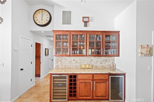 2921 Crestview Dr, Clearlake, CA 95422 - indoor dry bar featuring beverage cooler, backsplash, light tile patterned floors, and baseboards