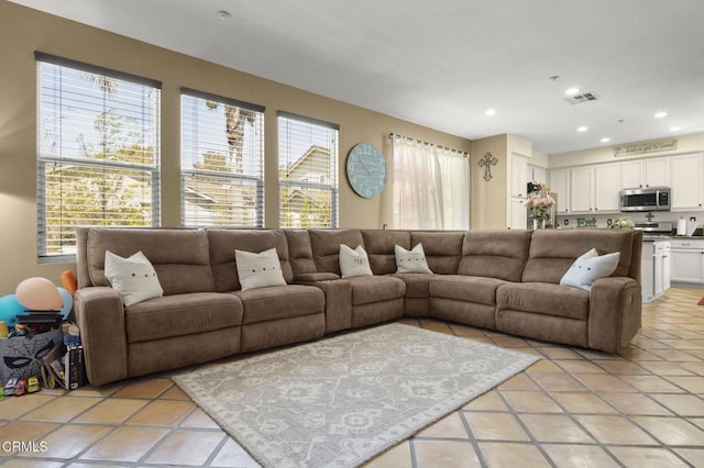 1269 Hacienda Dr, Oxnard, CA 93030 - living room with light tile patterned flooring and recessed lighting