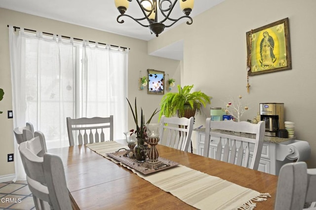 1269 Hacienda Dr, Oxnard, CA 93030 - dining room with a chandelier and baseboards