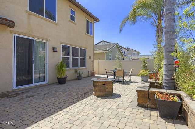1269 Hacienda Dr, Oxnard, CA 93030 - view of patio / terrace with a fire pit and outdoor dining area