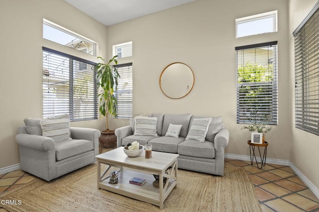 1269 Hacienda Dr, Oxnard, CA 93030 - living room featuring healthy amount of natural light, baseboards, and tile patterned floors