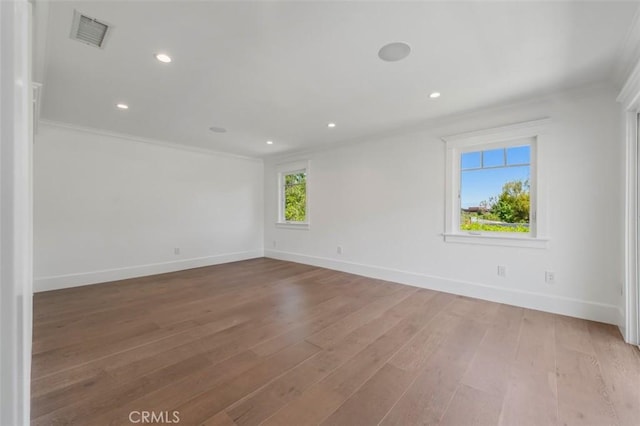 20701 Dumont St, Woodland Hills, CA 91364 - unfurnished room featuring crown molding, light wood finished floors, baseboards, and recessed lighting