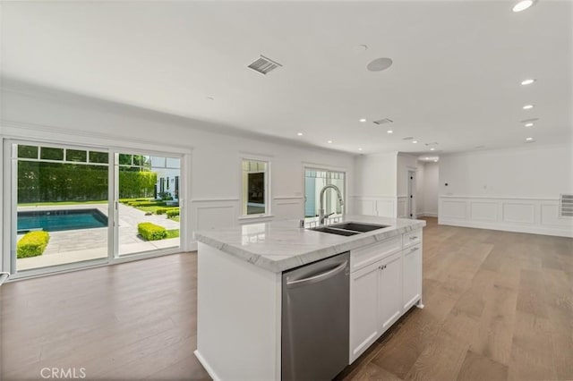 20701 Dumont St, Woodland Hills, CA 91364 - kitchen with a sink, stainless steel dishwasher, plenty of natural light, a decorative wall, and light wood-style flooring