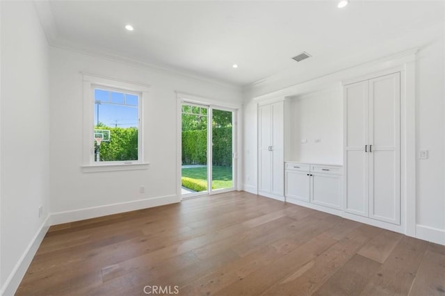 20701 Dumont St, Woodland Hills, CA 91364 - unfurnished bedroom featuring access to outside, light wood-type flooring, crown molding, baseboards, and recessed lighting