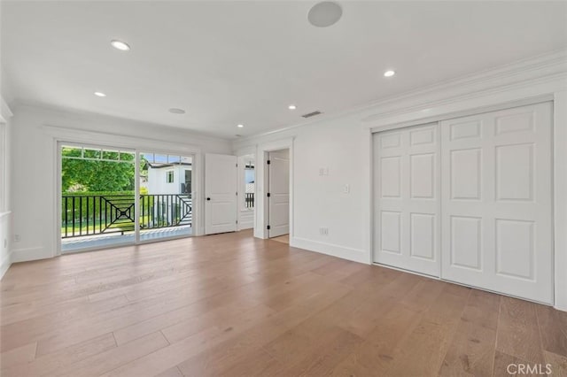 20701 Dumont St, Woodland Hills, CA 91364 - unfurnished bedroom with access to exterior, light wood-style flooring, ornamental molding, baseboards, and recessed lighting