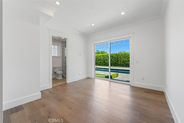 20701 Dumont St, Woodland Hills, CA 91364 - empty room with crown molding, plenty of natural light, baseboards, hardwood / wood-style floors, and recessed lighting