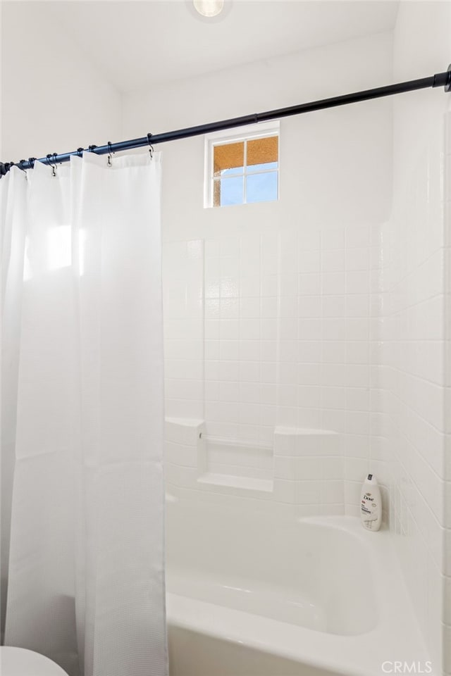 84020 Colibri Ct, Indio, CA 92203 - bathroom with shower / bath combination with curtain