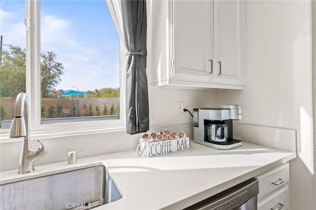 84020 Colibri Ct, Indio, CA 92203 - kitchen with white cabinets and light countertops