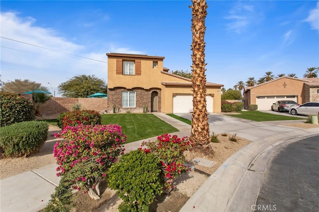 84020 Colibri Ct, Indio, CA 92203 - mediterranean / spanish-style house featuring stucco siding, driveway, a garage, a front lawn, and a tile roof