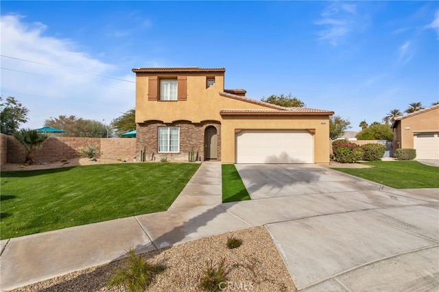 84020 Colibri Ct, Indio, CA 92203 - mediterranean / spanish house with stucco siding, concrete driveway, an attached garage, and a tiled roof