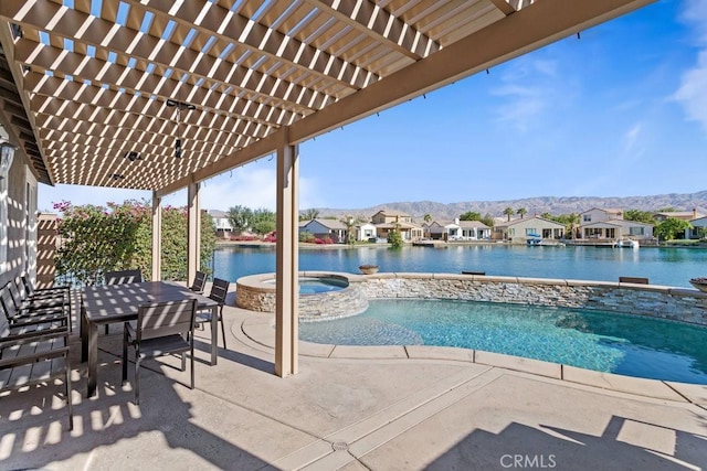 84250 Tramonto Way, Indio, CA 92203 - view of pool with a residential view, a pool with connected hot tub, a pergola, a water and mountain view, and a patio area