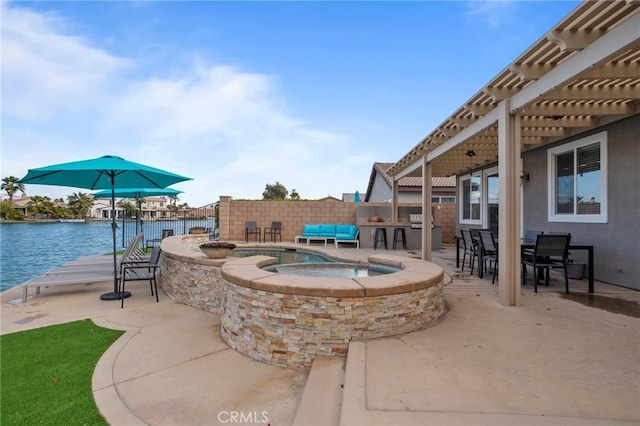 84250 Tramonto Way, Indio, CA 92203 - view of patio with a pergola, a water view, and a pool with connected hot tub