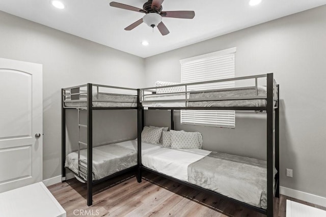 84250 Tramonto Way, Indio, CA 92203 - bedroom with baseboards, wood finished floors, recessed lighting, and ceiling fan