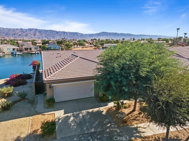 84250 Tramonto Way, Indio, CA 92203 - aerial view of residential area with a water and mountain view