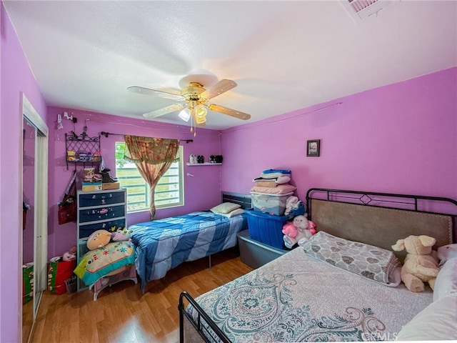 45431 Sancroft Ave, Lancaster, CA 93535 - bedroom with wood finished floors and a ceiling fan