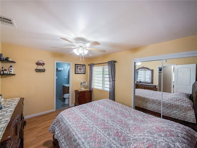 45431 Sancroft Ave, Lancaster, CA 93535 - bedroom featuring light wood-type flooring, baseboards, ceiling fan, and ensuite bath