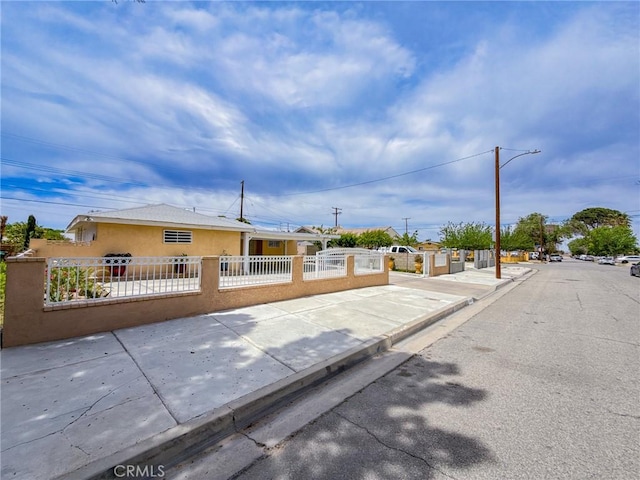 45431 Sancroft Ave, Lancaster, CA 93535 - view of front of house with stucco siding and a fenced front yard