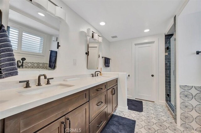 306 Avenida Monterey, San Clemente, CA 92672 - full bath with double vanity, a stall shower, and recessed lighting