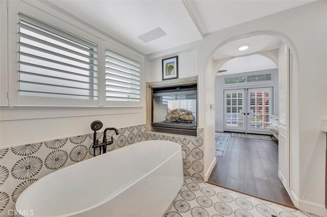 306 Avenida Monterey, San Clemente, CA 92672 - full bathroom with french doors and a soaking tub