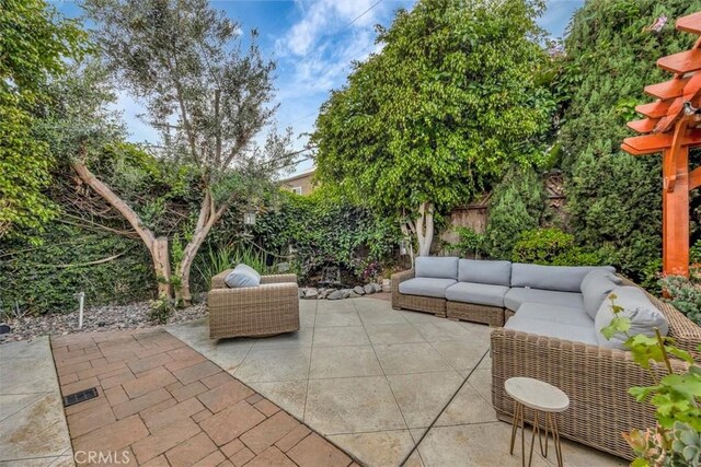 306 Avenida Monterey, San Clemente, CA 92672 - fenced backyard with outdoor lounge area and a patio area