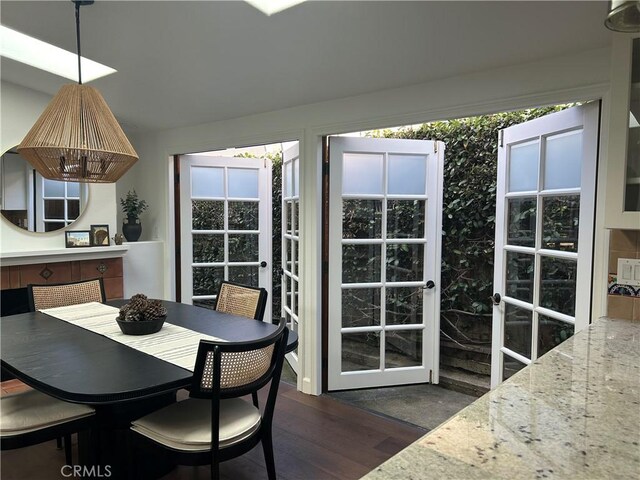 306 Avenida Monterey, San Clemente, CA 92672 - dining area with french doors and dark wood-style flooring