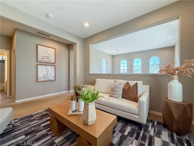 6184 Lafayette St, Chino, CA 91710 - living room with carpet flooring, baseboards, and recessed lighting