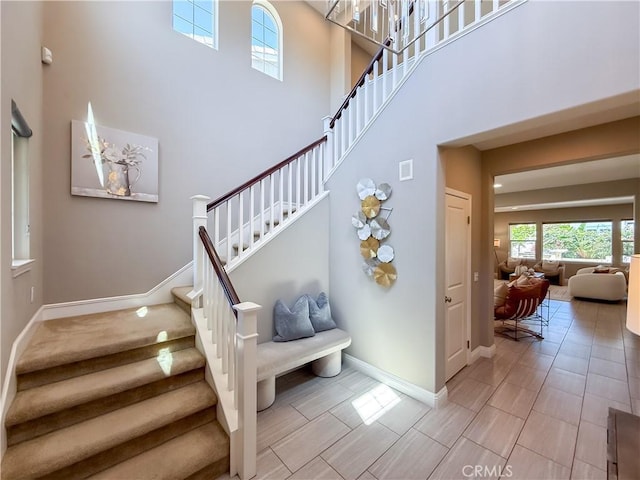 6184 Lafayette St, Chino, CA 91710 - stairs with a towering ceiling and baseboards
