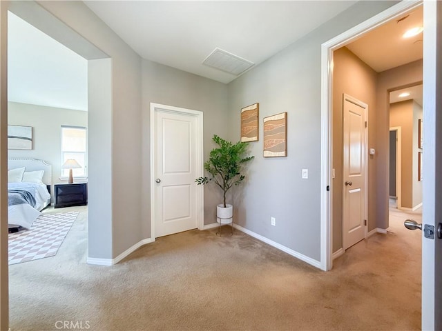 6184 Lafayette St, Chino, CA 91710 - corridor featuring light colored carpet and baseboards