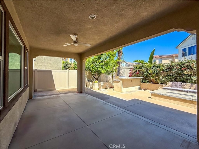 6184 Lafayette St, Chino, CA 91710 - fenced backyard featuring a patio and a ceiling fan
