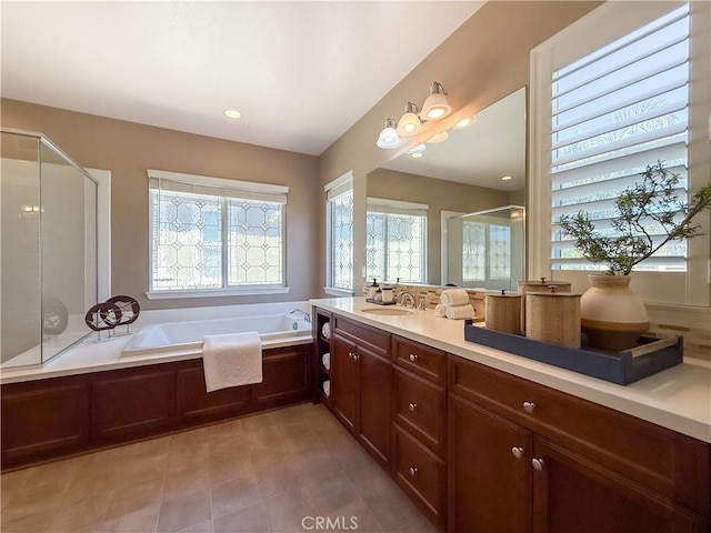 6184 Lafayette St, Chino, CA 91710 - full bathroom featuring a shower stall, a bath, and vanity