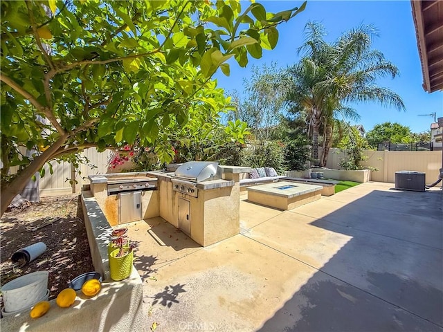 6184 Lafayette St, Chino, CA 91710 - fenced backyard with a patio area, an outdoor fire pit, and central air condition unit